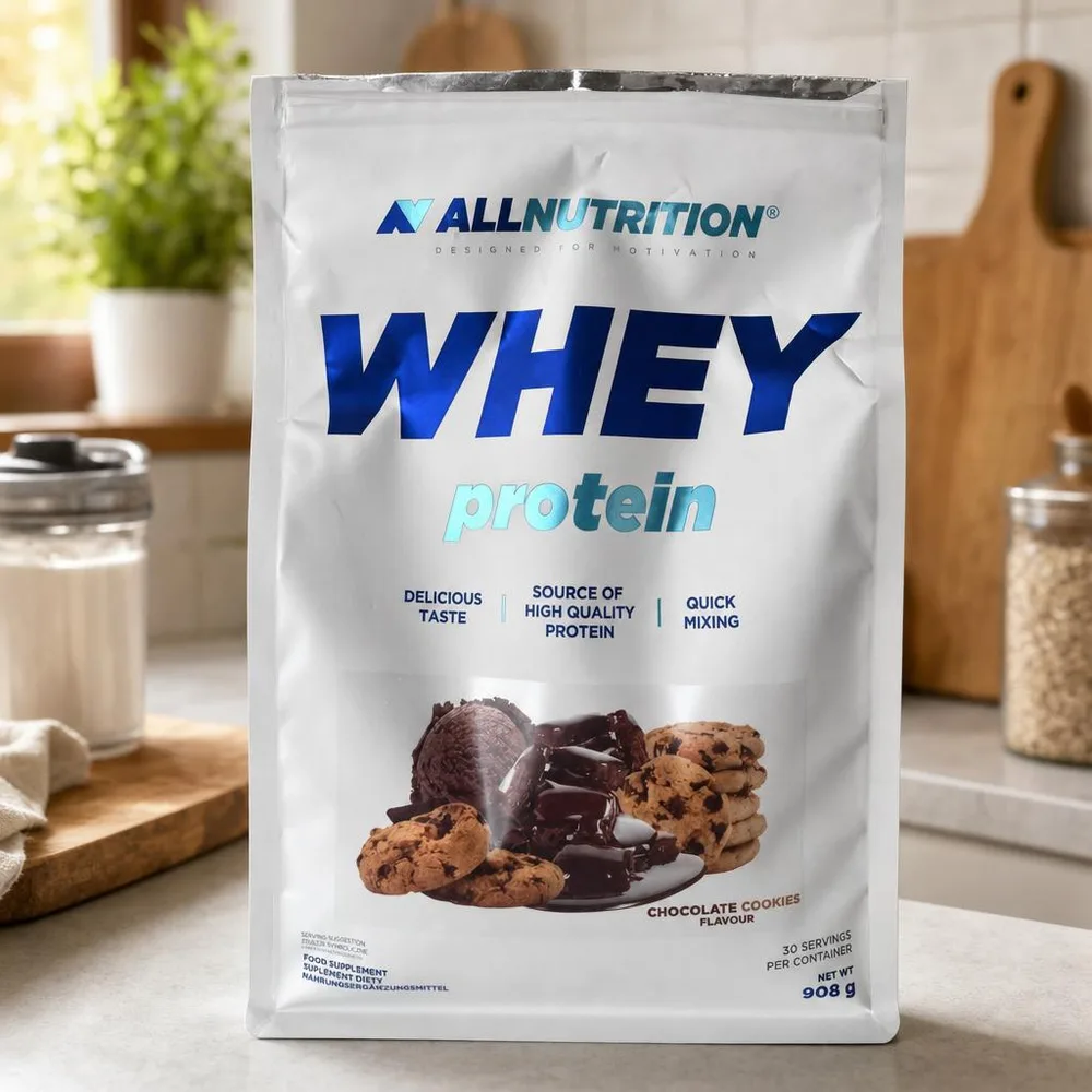 Phone photo of a whey protein bag on a kitchen shelf